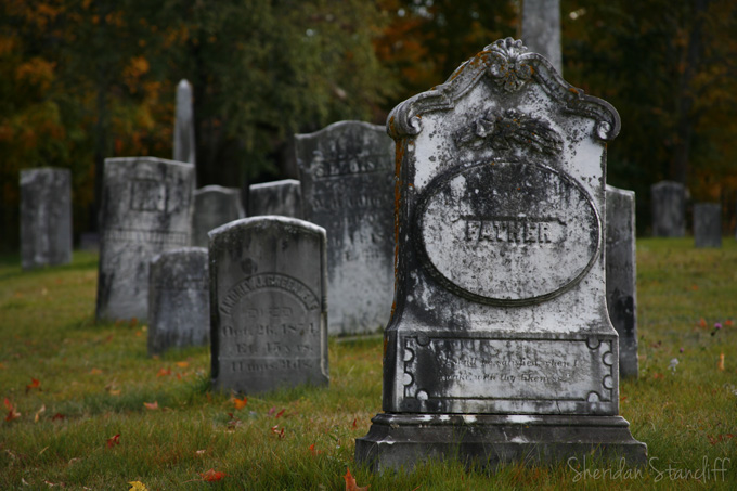 A shot of headstones in a cemetery in New England