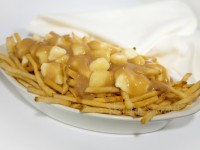 Poutine - a Canadian dish of French fries covered in gravy and cheese curds